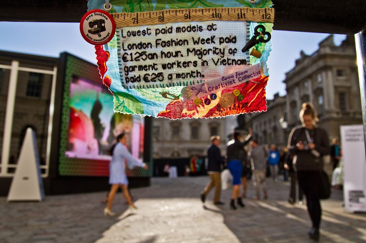 Crowd outside a London Fashion Week venue at Somerset House